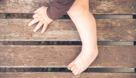 Tiny hands and feet of a baby, retro style.